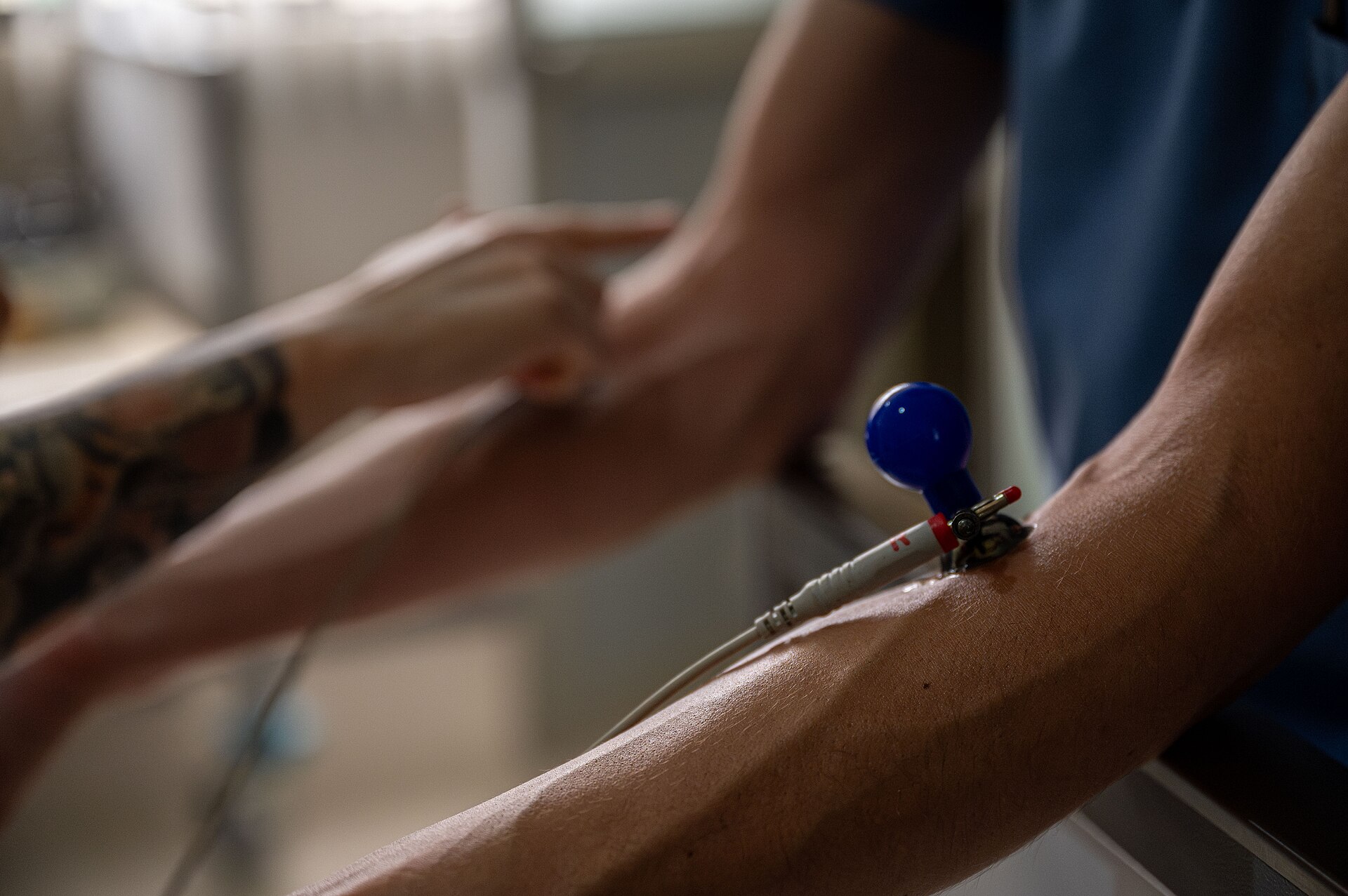 EKG at Urgent Care: When It Helps and When to Call 911 2 Electrode being placed on a patient for an EKG